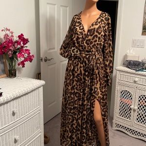 Bambu Apparel  animal print dress. Tan/Brown. Short lined dress underneath. Sm.